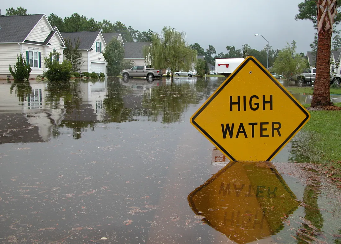 Helping communities swamped by flood insurance barriers